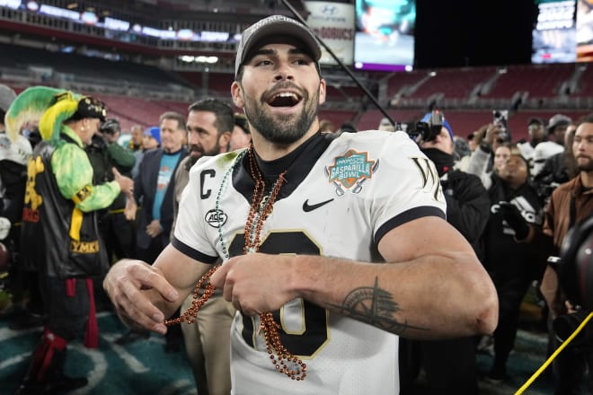 Wake Forest QB Sam Hartman celebrates a Gasparilla Bow victory Dec. 23 in Tampa, Fla., a couple of weeks before he committed to transfer to Notre Dame.