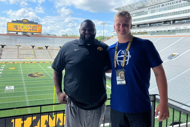 Ted Hammond with Iowa defensive line coach Kelvin Bell at the Hawkeye Tailgater on Sunday.