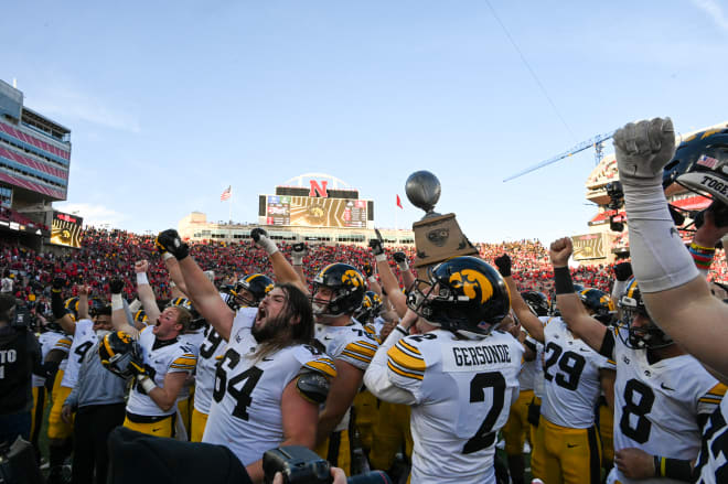 The Hawkeyes celebrate their tenth win of the season. 