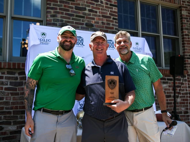 Former Notre Dame linebacker Bob Crable, center, poses with Mike Golic Jr. (left) and Mike Golic Sr. at last year's Golic SubPar Classic.