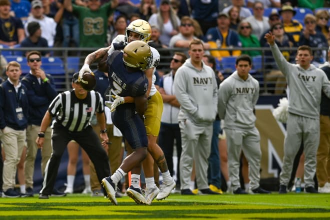 Notre Dame wide receiver Braden Lenzy makes a magnificent grab over Mbiti Williams Jr. for a touchdown. 