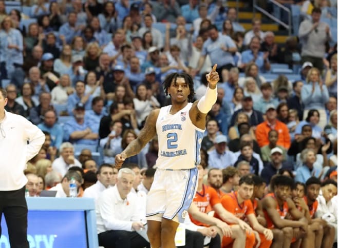 UNC guards Caleb Love and RJ Davis discussed Saturday why they used social media Thursday responding to the "noise." 