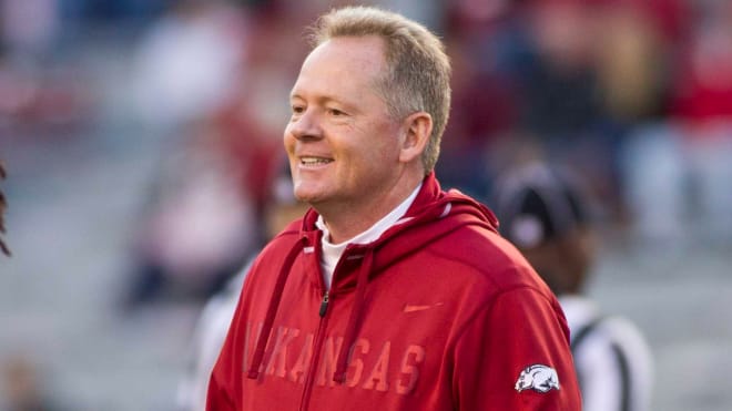 Bobby Petrino, who was hired as offensive coordinator for the Razorbacks, as head coach for Arkansas during a matchup with Tennessee on Nov. 13, 2011.