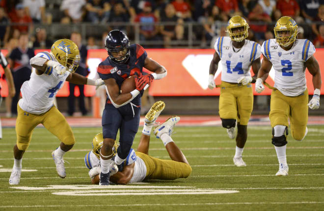 Tyler Manoa comes up with a tackle for UCLA against Arizona in a game back in 2019.