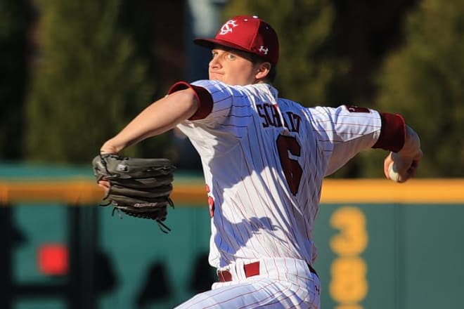 Clarke Schmidt throws a pitch in Friday's game