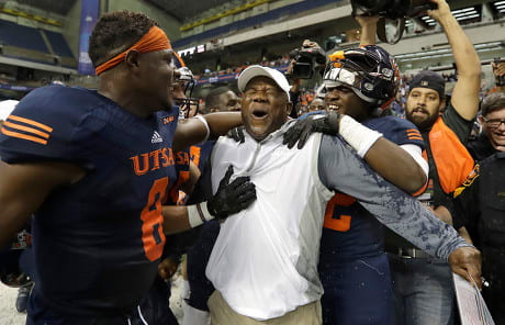 UTSA Head Coach Frank Wilson reacts after getting a Gatorade bath following the win over Charlotte on November 26, 2016.