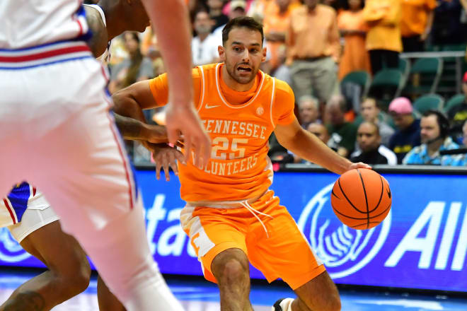 Nov 22, 2023; Honolulu, HI, USA; Tennessee Volunteers guard Santiago Vescovi (25) drives to the basket during the first half against the Kansas Jayhawks at SimpliFi Arena at Stan Sheriff Center.