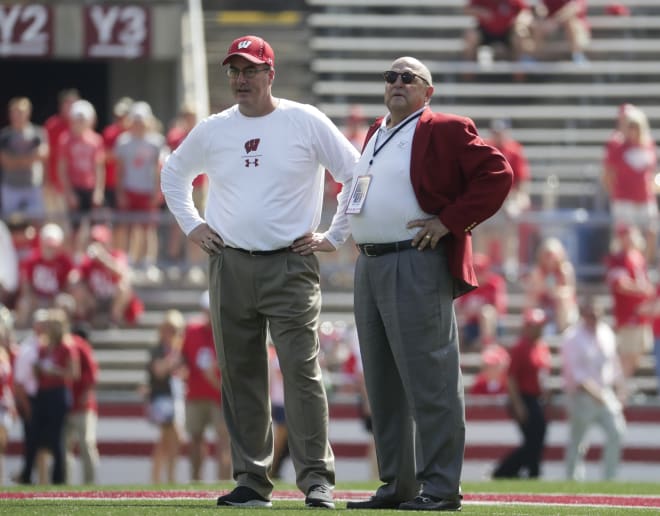 Head coach Paul Chryst (left) and athletic director Barry Alvarez.