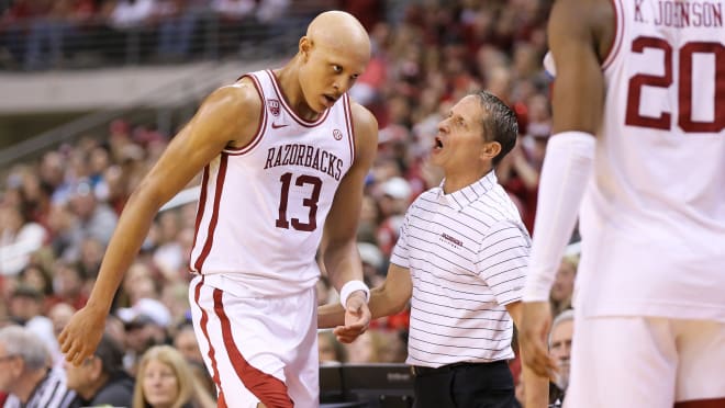 Arkansas coach Eric Musselman talks with freshman Jordan Walsh, who is at the NBA Draft Combine this week.