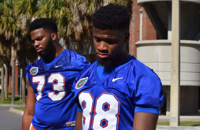 Junior offensive tackle Martez Ivey (73) and freshman tight end Kemore Gamble (88)
