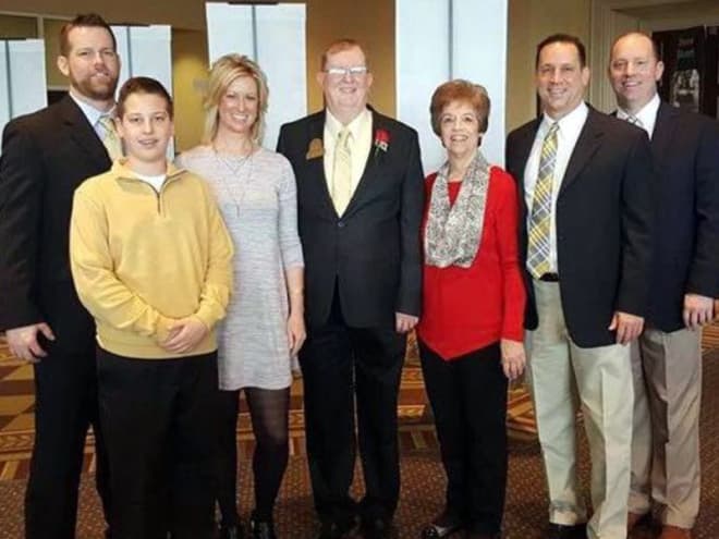 When family members are celebrated, like husband Oscar was last year for the Kentucky High School Hall of Fame, Donna makes sure the entire brood comes together. (From L-R, Brian, grandson Brady, Kim, Oscar, Donna, Greg and Jeff)