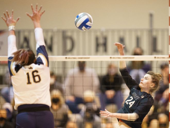 Army West Point Junior Cate Buckingham (#24) attacks the net against Notre Dame  