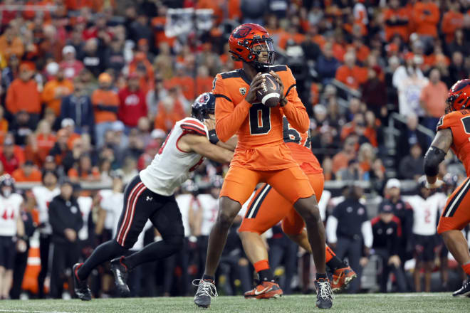 While at Oregon State, Aidan Chiles looks to throw the ball versus Utah on Sept. 29, 2023.