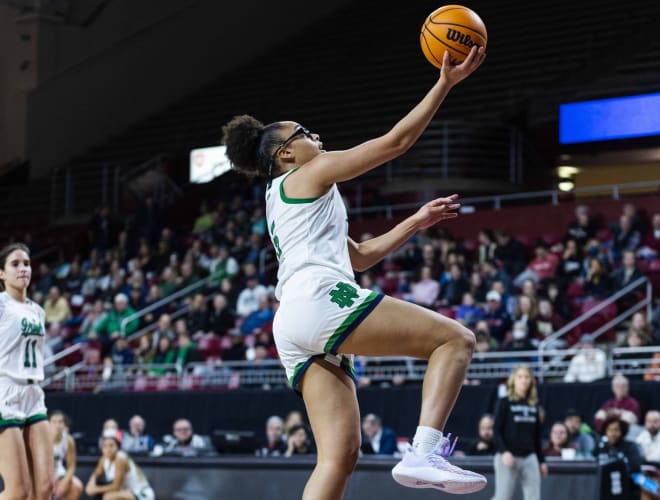 Irish guard Olivia Miles drives for two of her 22 points Thursday night in No. 9 ND's 72-59 road win at Boston College.