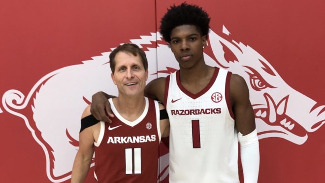 Arkansas head coach Eric Musselman and 2020 4-star signee KK Robinson.