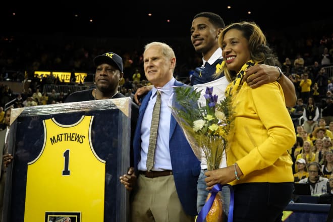 Charles Matthews and family with Beilein. 