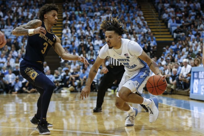 Notre Dame guard Prentiss Hubb (left) had a career-high 22 points but it wasn't enough to outdo North Carolina freshman Cole Anthony;s  34-point effort.