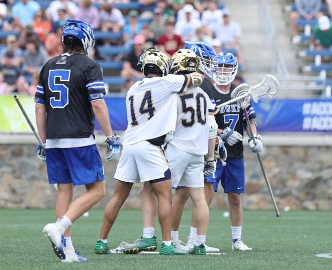 Chris Kavanagh (50) and Jordan Faison (14) celebrated one of Kavanagh's three goals in Notre Dame's 16-6 win over Duke Sunday in the ACC Tourney title game.