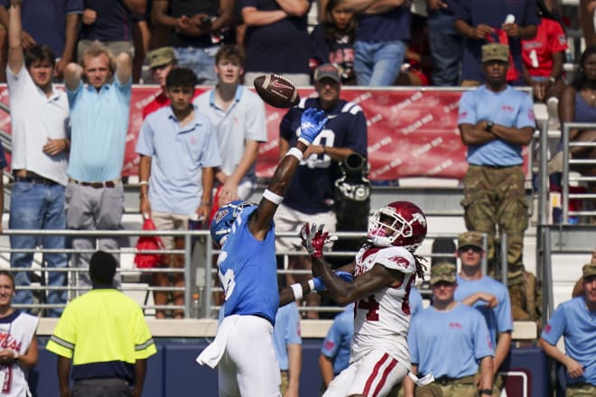 Ole Miss ebels defensive back-turned-wide receiver Miles Battle (6) knocks away the pass intended for Arkansas Razorbacks wide receiver Warren Thompson (84) at Vaught-Hemingway Stadium. Marvin Gentry-USA TODAY Sports