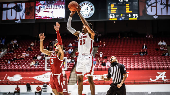 Desi Sills attempts to guard Alabama sharp-shooter John Petty Jr.