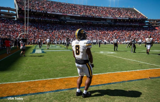 Peat stands shocked in the end zone after his fumble on the final play resulted in Auburn's 17-14 win