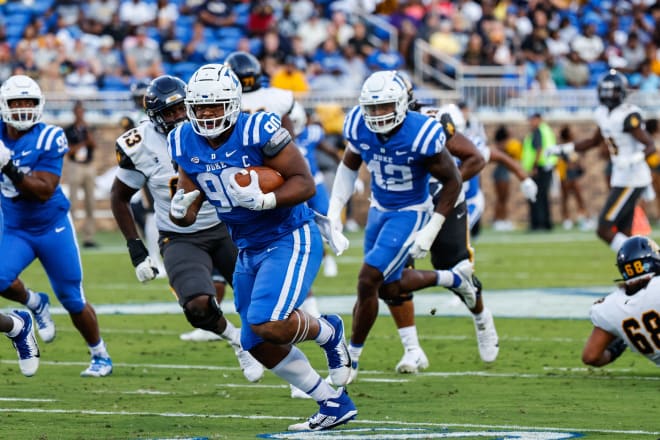 DeWayne Carter runs after a fumble recovery, eventually scoring, against N.C. A&T last weekend. 