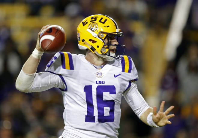Danny Etling throws a pass during the second half