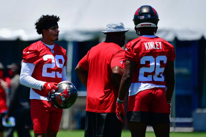 May 14, 2021; Tampa Bay, Florida, USA; Tampa Bay Buccaneers corner back Chris Wilcox (29) and corner back Cameron Kinley (26) look on during rookie mini-camp at AdventHealth Training Center 