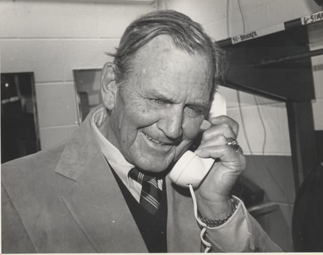 Former Alabama head coach Paul "Bear" Bryant talks on the phone to President Ronald Reagan after beating Auburn in 1981 to win his 315th game. Photo | Paul W. Bryant Museum 
