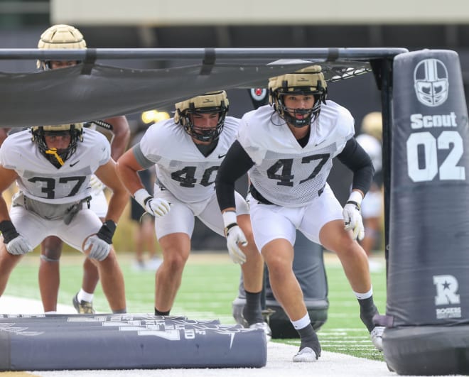 Purdue Boilermakers linebackers Domanick Moon (47), Hudson Miller (40) and Jacob Wahlberg (37) run through drill together during practice, Monday, Aug. 8, 2022, at Ross-Ade Stadium in West Lafayette, Ind. Purdue Linebackers