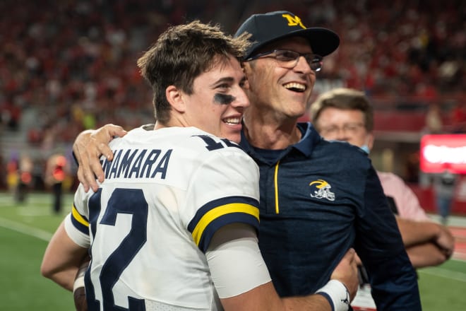 Michigan Wolverines football quarterback Cade McNamara and head coach Jim Harbaugh