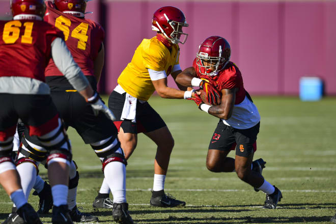 Sophomore running back Kenan Christon takes the handoff on Monday.