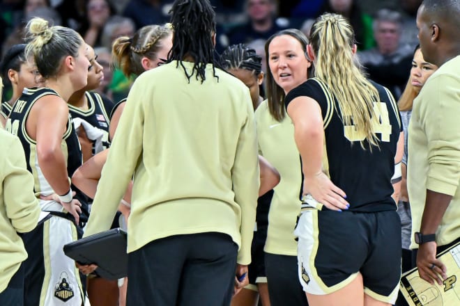 Dec 17, 2023; South Bend, Indiana, USA; Purdue Boilermakers head coach Katie Gearlds talks to her players during a timeout in the first half against the Notre Dame Fighting Irish at the Purcell Pavilion. Mandatory Credit: Matt Cashore-USA TODAY Sports
