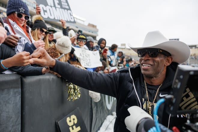 Colorado coach Deion Sanders meets with fans after the Buffs' spring game Saturday