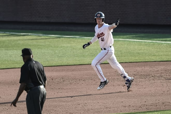 Williams saved a run with an outfield assist and hit a grand slam for Auburn Saturday.