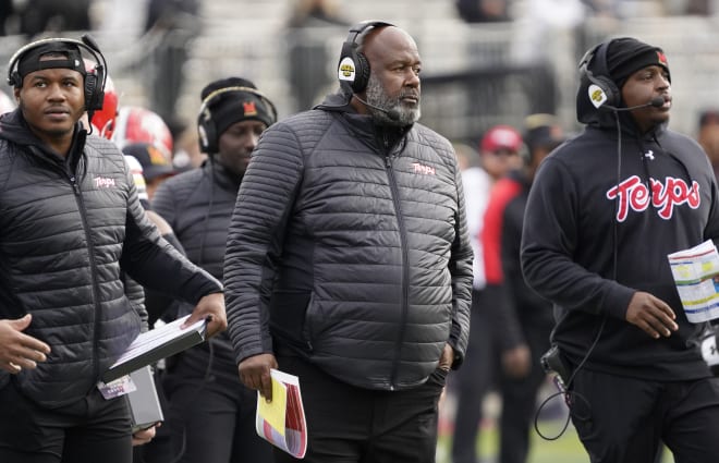 Oct 28, 2023; Evanston, Illinois, USA; Maryland Terrapins head coach Mike Locksley (center) on the sidelines during the second half at Ryan Field. Mandatory Credit: David Banks-USA TODAY Sports