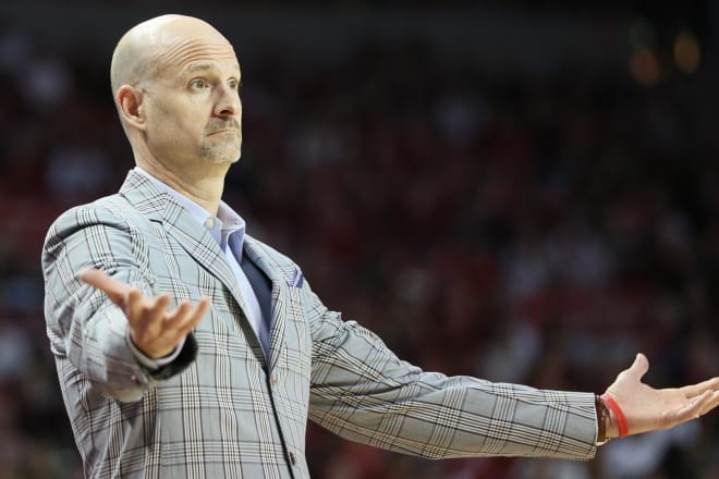 Ole Miss coach Andy Kennedy looks on during his team's 98-80 loss at Arkansas Saturday evening 
