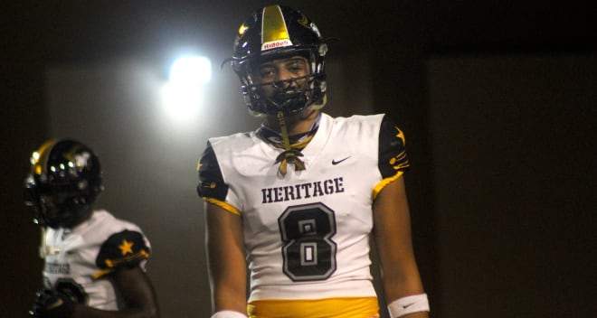 Florida defensive end Marvin Jones Jr. holds  a Michigan football recruiting offer from Jim Harbaugh.