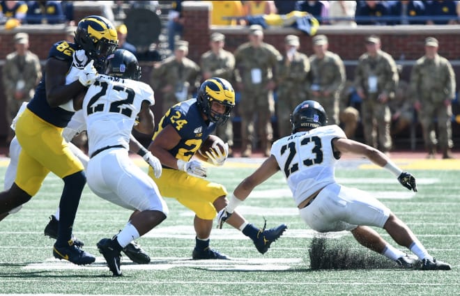 Michigan Wolverines football freshman running back Zach Charbonnet became the first U-M freshman to receive 33 carries in a game AND rush for 100 yards since Mike Hart in 2004.