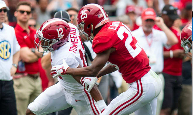 Defensive back Eddie Smith (25) stops wide receiver Chadarius Townsend (12) during second half action in the Alabama A-Day spring football scrimmage game at Bryant Denny Stadium in Tuscaloosa, Ala. Photo | Imagn