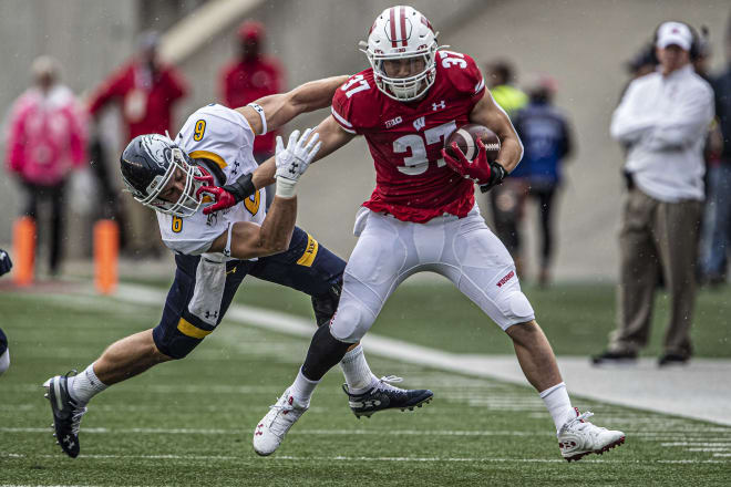 Jonathan Taylor had five touchdowns and UW's defense produced its third  shutout in five games in a 48-0 victory over Kent State