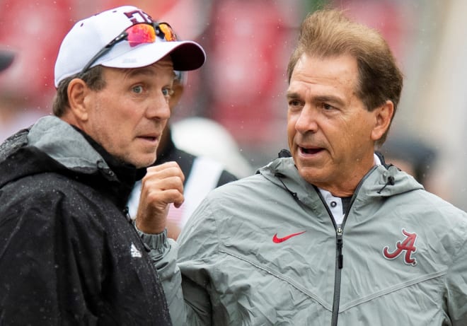 Jimbo Fisher, left, and Nick Saban 