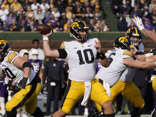 Deacon Hill and Iowa escaped Wrigley Field with a in on Saturday night thanks to some big plays. 