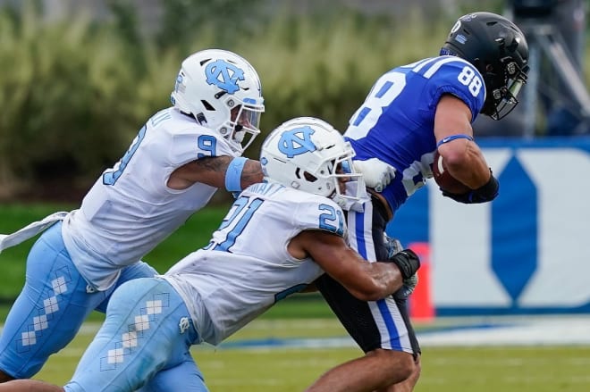 UNC's win at Duke was one of the games last fall in which Cam Kelly (9) graded out well. 