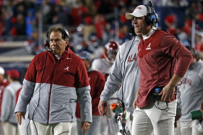 Alabama Crimson Tide Head Coach Nick Saban (left) walk along the sideline during the second half against the Mississippi Rebels at Vaught-Hemingway Stadium. Photo |  Petre Thomas-USA TODAY Sports