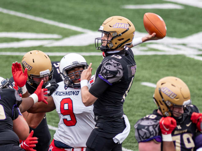 James Madison quarterback Cole Johnson throws during the Dukes' win over Richmond on Saturday in Harrisonburg.