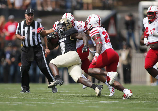 K.D. Nixon avoids defenders during a 34-31 overtime win at home against Nebraska on Sept. 7, 2019