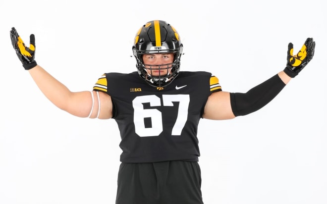 Offensive lineman Landen Livingston made his official visit with the Iowa Hawkeyes this weekend.