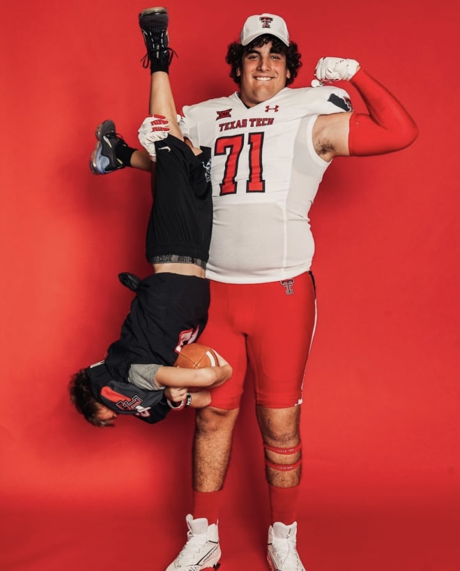 Cade McConnell with his little brother at Texas Tech
