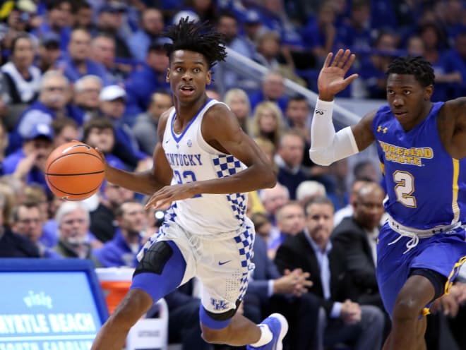 Kentucky freshman guard Shai Gilgeous-Alexander races past Morehead State's Jordan Walker during the first half of Monday's "Kentucky Cares Classic" charity game at Rupp Arena. 